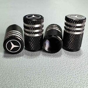 4 Mercedes air valve caps. Rim center caps and door projector lights available